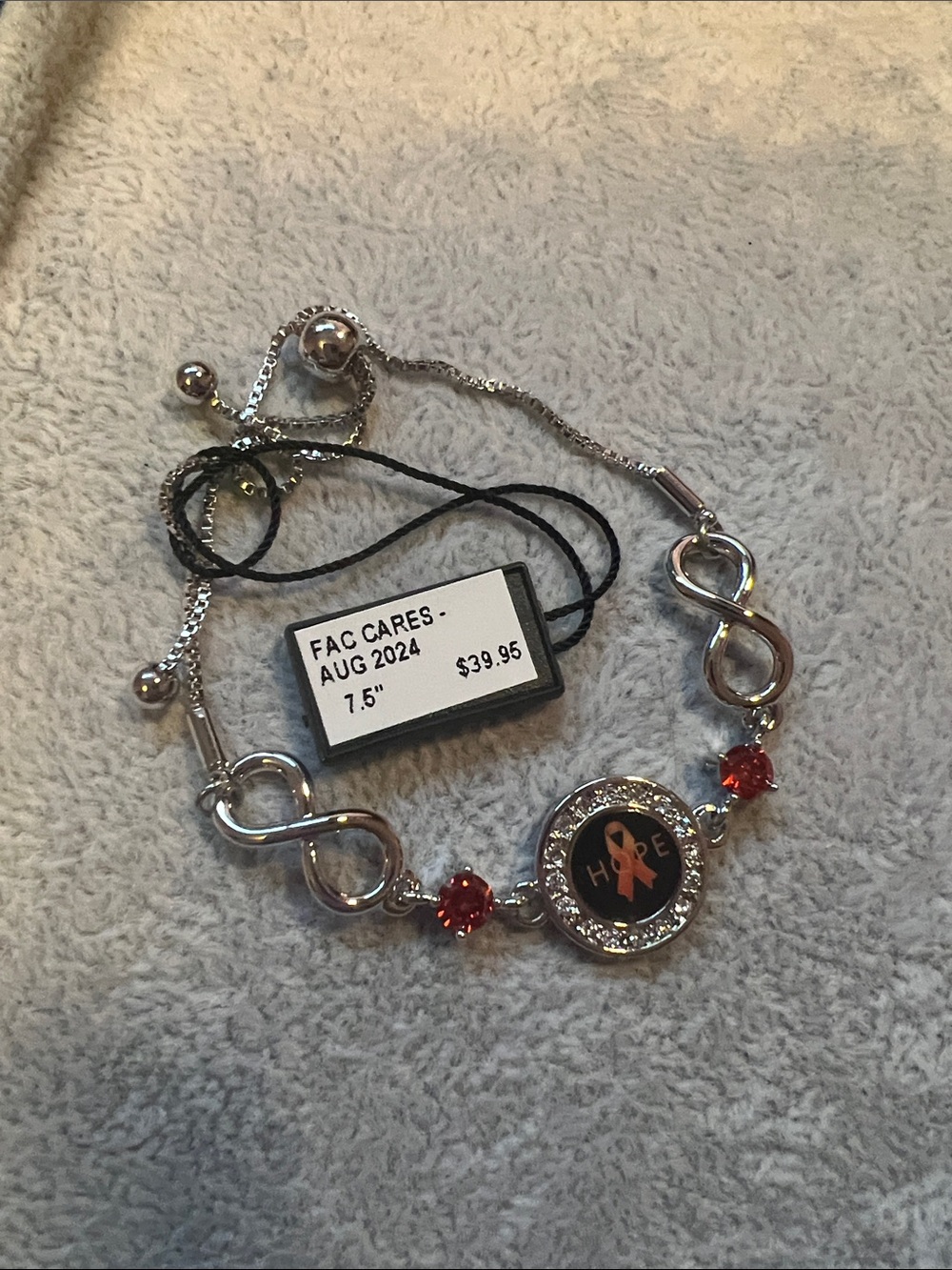 Silver-Tone Hope Ribbon Bracelet with Red Crystal Accents